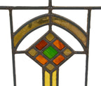 original early 1920's prairie school style interior residential leaded art glass window featuring a centrally located segmented diamond with gold "flash" glass