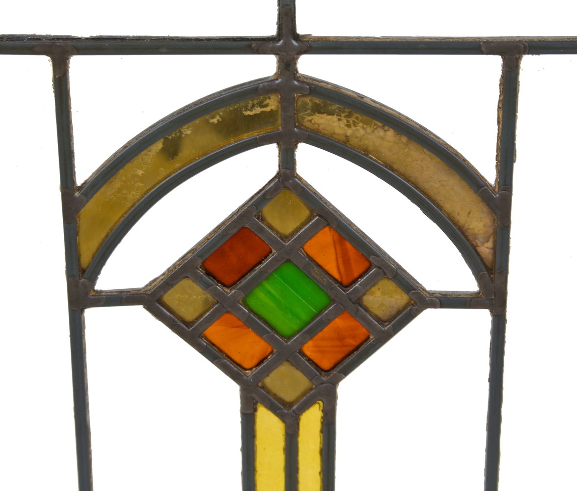 original early 1920's prairie school style interior residential leaded art glass window featuring a centrally located segmented diamond with gold "flash" glass