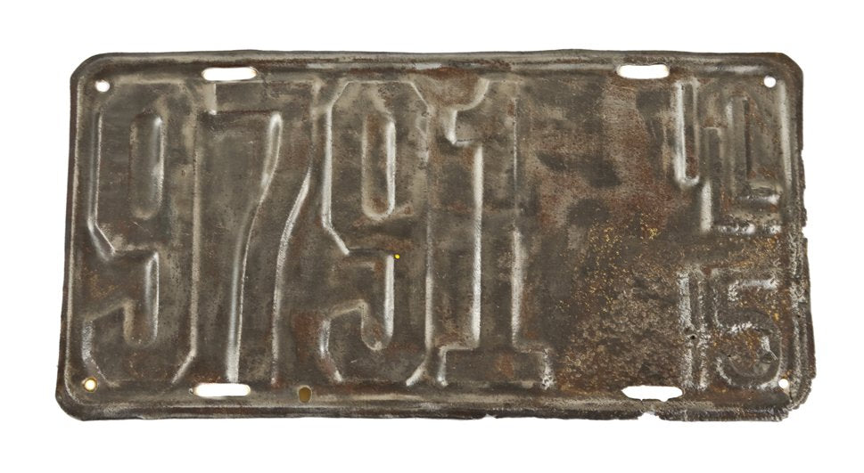 original c. 1915 american antique industrial single-sided stamped steel automobile or commercial truck license plate with a brushed metal finish