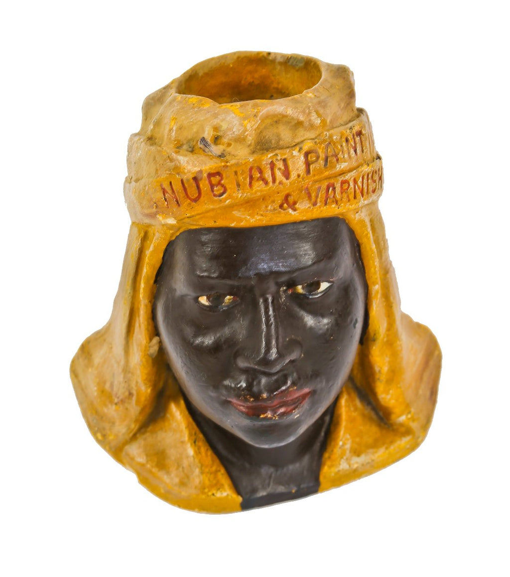 very rare early 20th century hand-painted polychromatic "nubian" brand paint and varnish company cast plaster advertising and/or promotional figure
