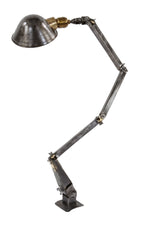 original hard to find and highly sought after patented early 20th century american industrial articulating factory machinist lamp with "universal" joints