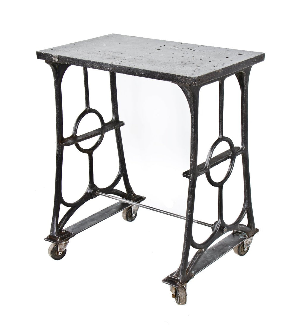 reconfigured american industrial mobile window sash frame factory work stand or station featuring 19th century molding or shaper machine cast iron legs