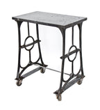 reconfigured american industrial mobile window sash frame factory work stand or station featuring 19th century molding or shaper machine cast iron legs