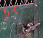 hard to find early 20th century original untouched american made painted green riveted joint steel four-unit "expanded metal type" freestanding locket with t-handles