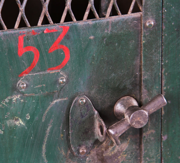 hard to find early 20th century original untouched american made painted green riveted joint steel four-unit "expanded metal type" freestanding locket with t-handles