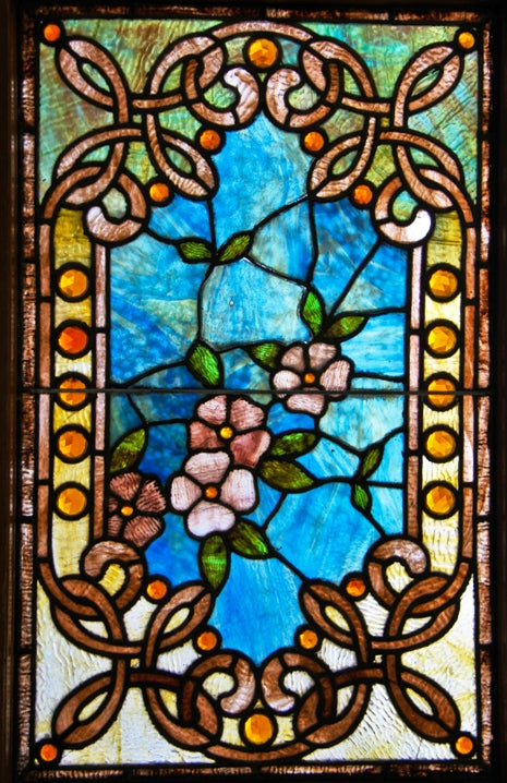 dazzling all original and largely intact c. 1880's high victorian era interior residential at glass window replete with celtic knots and multifaceted amber glass jewels