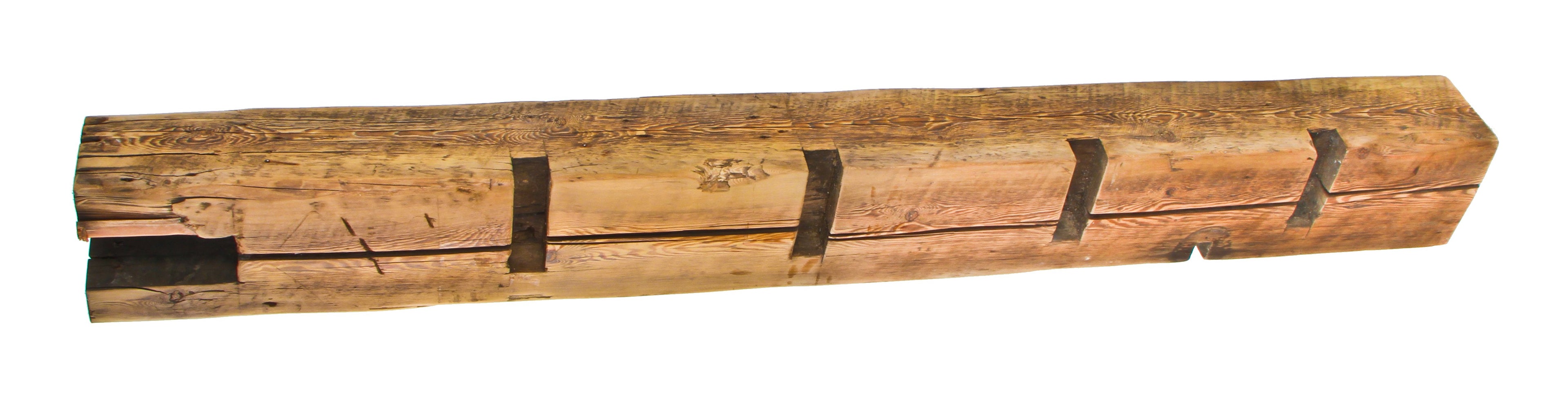 massive c. 1855 old growth yellow pine heavily notched john kent russell residential balloon frame wood sill plate with a lightly sanded finish and mortised end