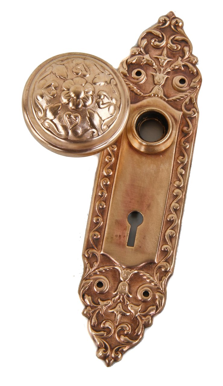 single "mura" pattern early 20th century wrought ornamented brass interior residential passage door backplate or escutcheon with matching banded rim doorknob