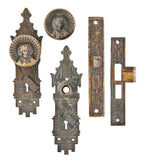 very rare and highly sought after all original 19th century american vestibule door complete lockset with "geisha girl" concave doorknob and matching backplates