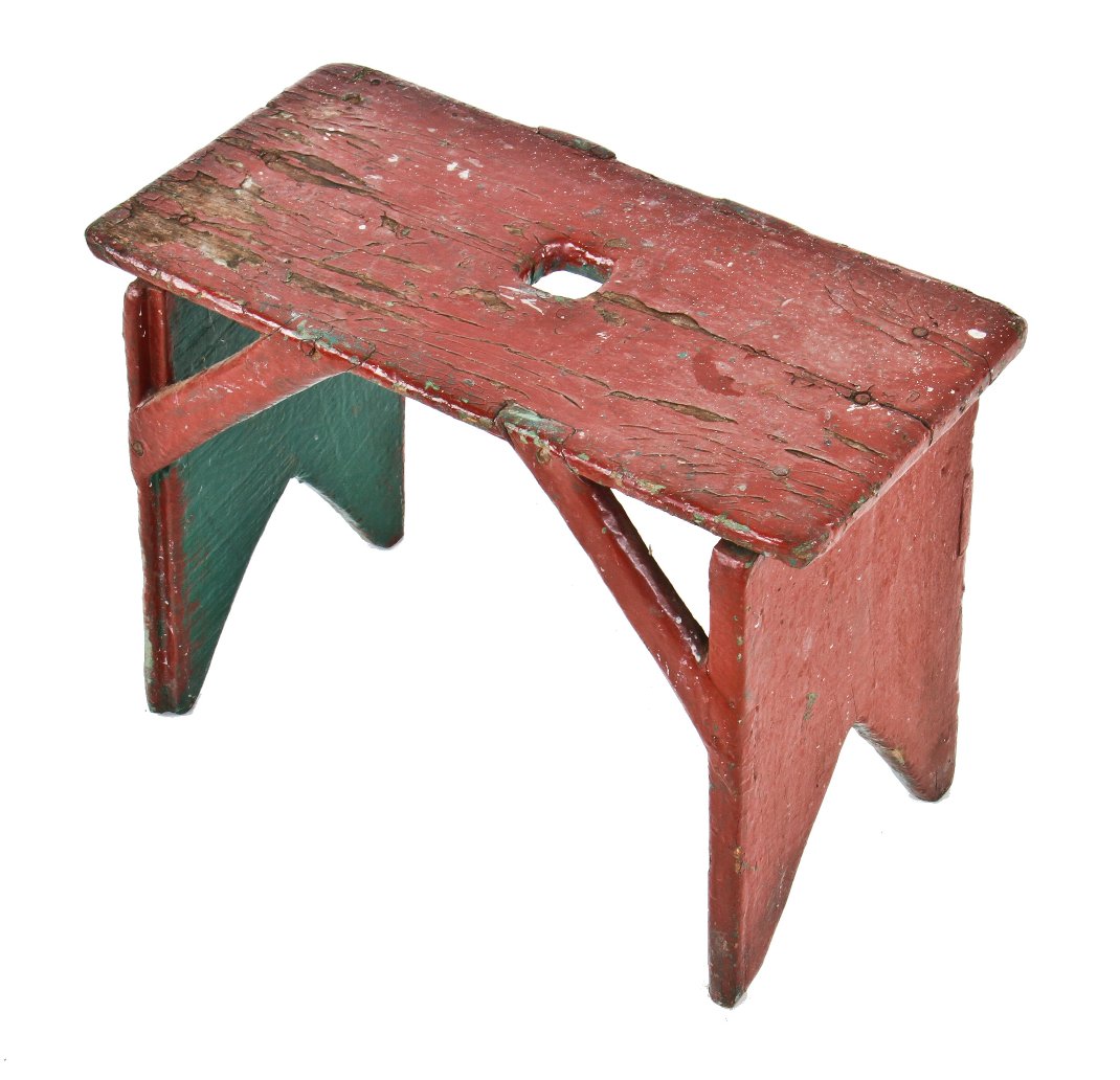 nicely weathered and worn original american industrial c. 1920's diminutive pine wood red painted bench or step stool with a green enameled underside