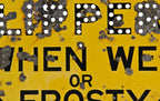 unique oversized c. 1940's vintage american industrial single-sided heavy gauge stamped steel diamond-shaped "slippery when wet cautionary road sign with bright yellow paint finish