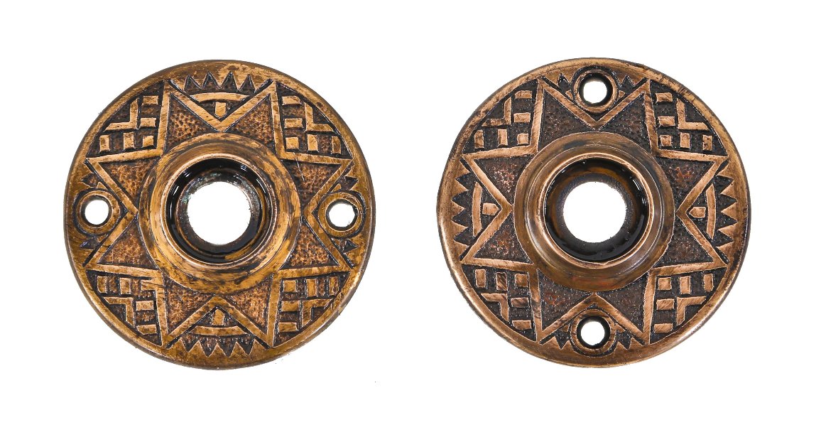 set of original c. 1880's antique american victorian era ornamental cast brass circular-shaped doorknob rosettes for a residential passage door