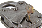 late 19th or early 20th century oversized heavy duty riveted joint wrought iron or steel padlock with intact shackle and original barrel key