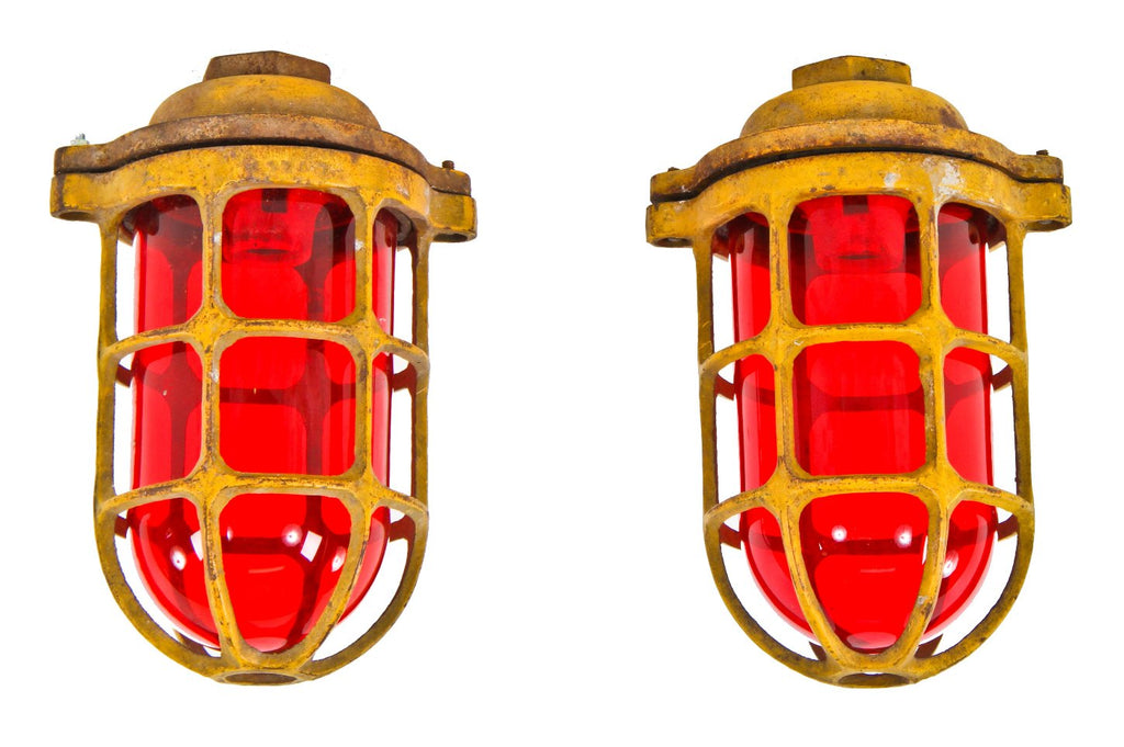 two matching brilliantly colored c. 1930's american antique industrial chicago river bridge caged metal caution or warning lights with pyrex ruby red glass globes