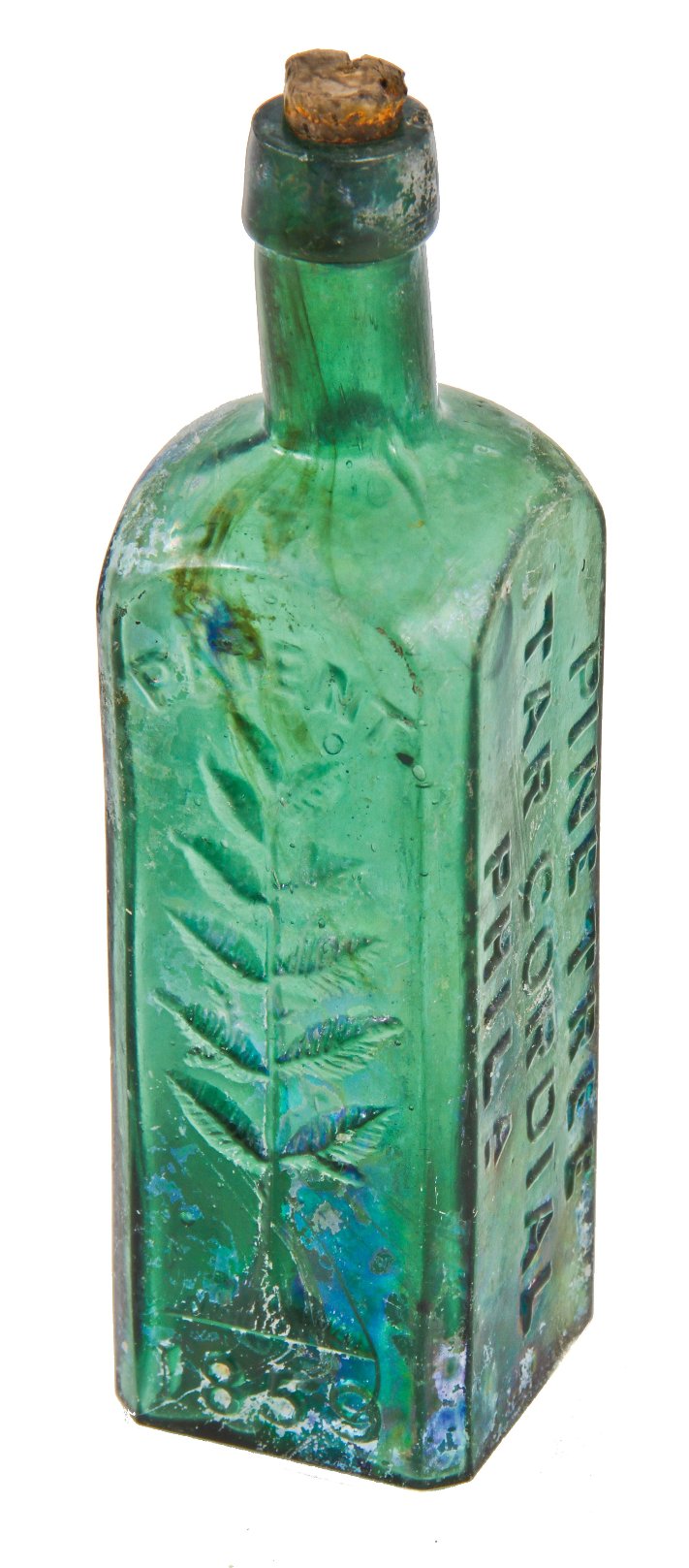 original early 1860's skillfully crafted emerald green hand-blown "pine tree tar cordial" dug bottle with pontil scar and slanted neck containing vertical straw marks ans seeds