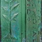 original early 1860's skillfully crafted emerald green hand-blown "pine tree tar cordial" dug bottle with pontil scar and slanted neck containing vertical straw marks ans seeds