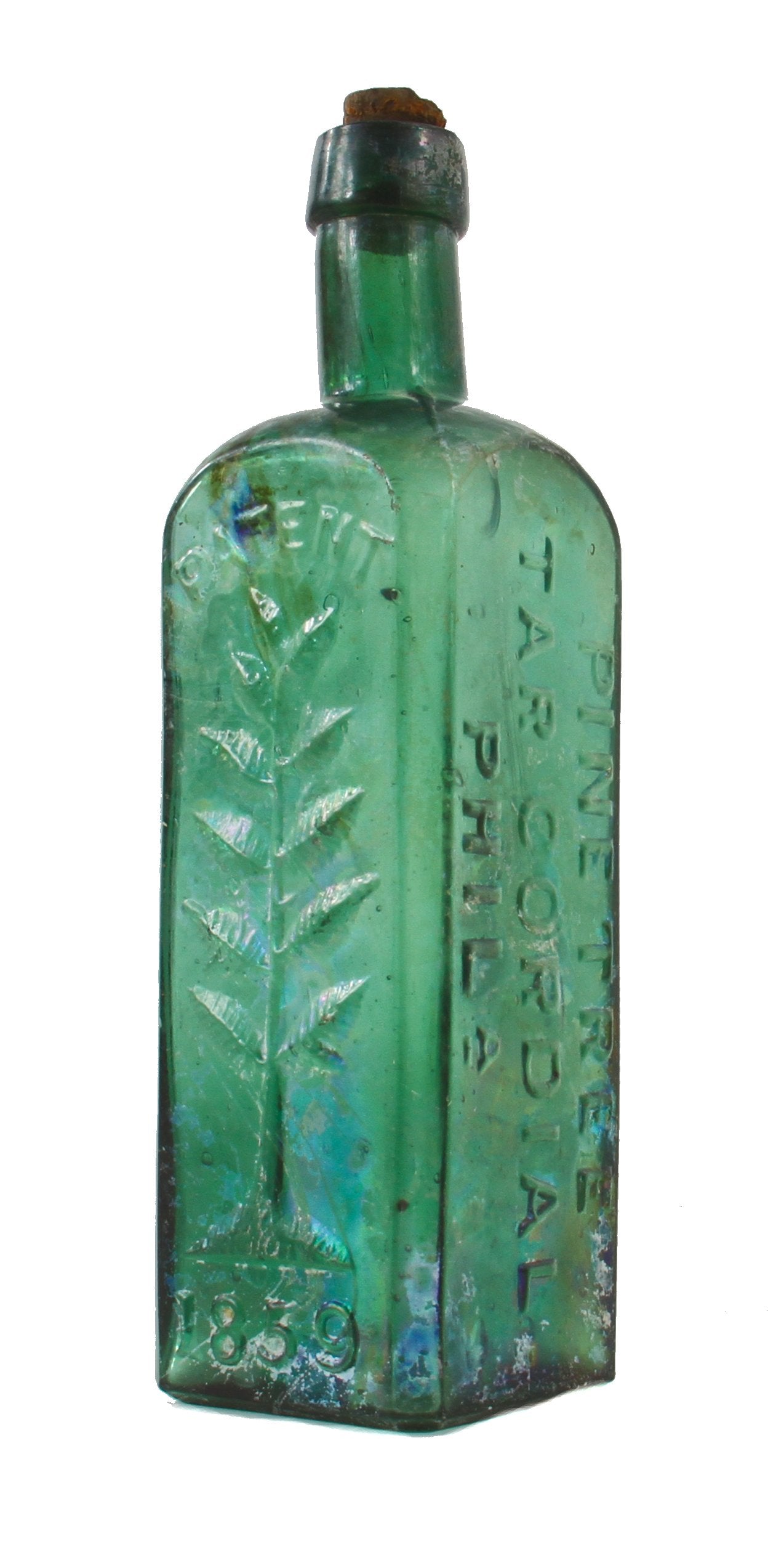 original early 1860's skillfully crafted emerald green hand-blown "pine tree tar cordial" dug bottle with pontil scar and slanted neck containing vertical straw marks ans seeds