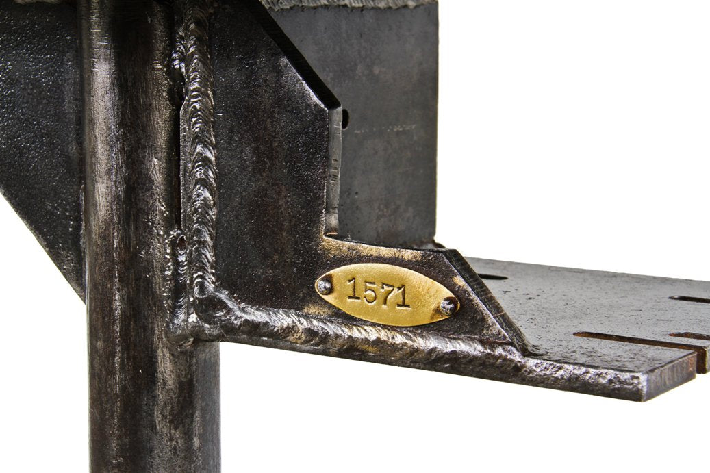 refinished c. 1920's grand rapids factory machine shop cast iron three-legged stamping press base with a newly added solid maple wood tabletop