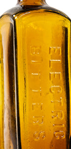 late nineteenth century antique american square golden amber 'electric bitters' privy dug tapered collar medicinal bottle manufactured for the h.e. bucklen & company