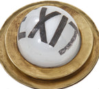 very unusual and visually distinctive all original c. 1930's american machine cast brass "speed ring" illuminated wall-mount theater exit light fixture with intact white opalescent glass globe