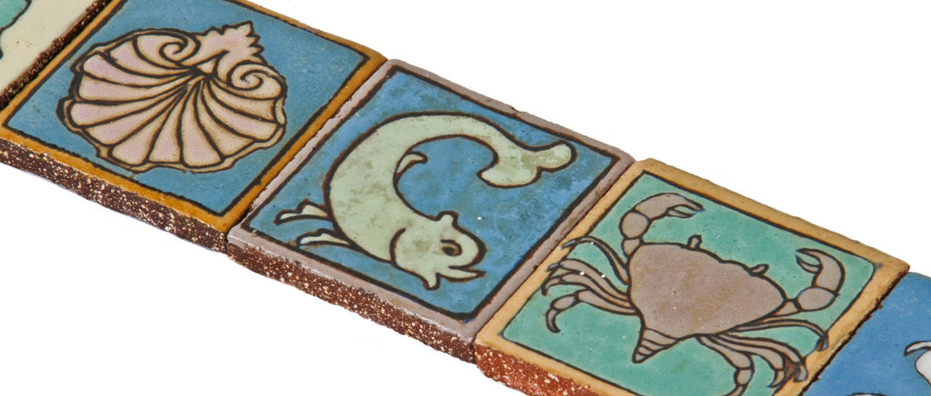 late 1920's important original and documented interior lakeshore drive athletic club wall-mount polychromatic nautical-themed red clay figural tile