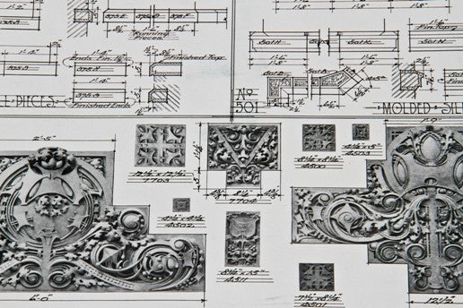 original early 20th century exterior white glazed terra cotta "sullivanesque" style exterior chicago garage salvaged facade element with discoloration