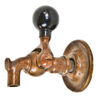 all original and nicely aged early 20th century heavy duty cast brass "imperial" saloon beer tap or spigot with solid black composition ball handle for controlling release of beer
