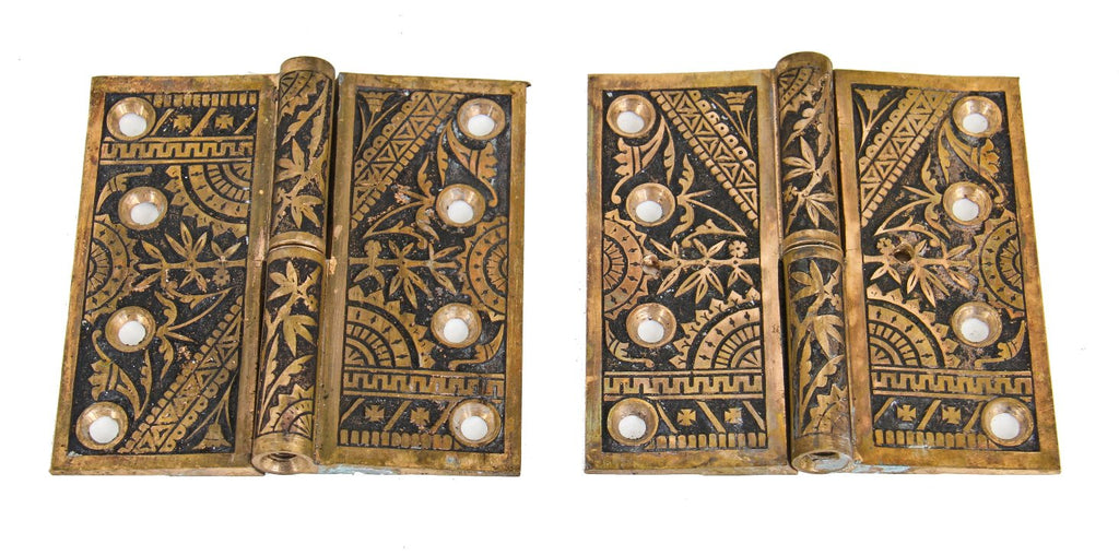 two matching original and largely intact american 19th century eastlake style "bamboo" pattern cast brass ornamented passage door hinges with elegant finials
