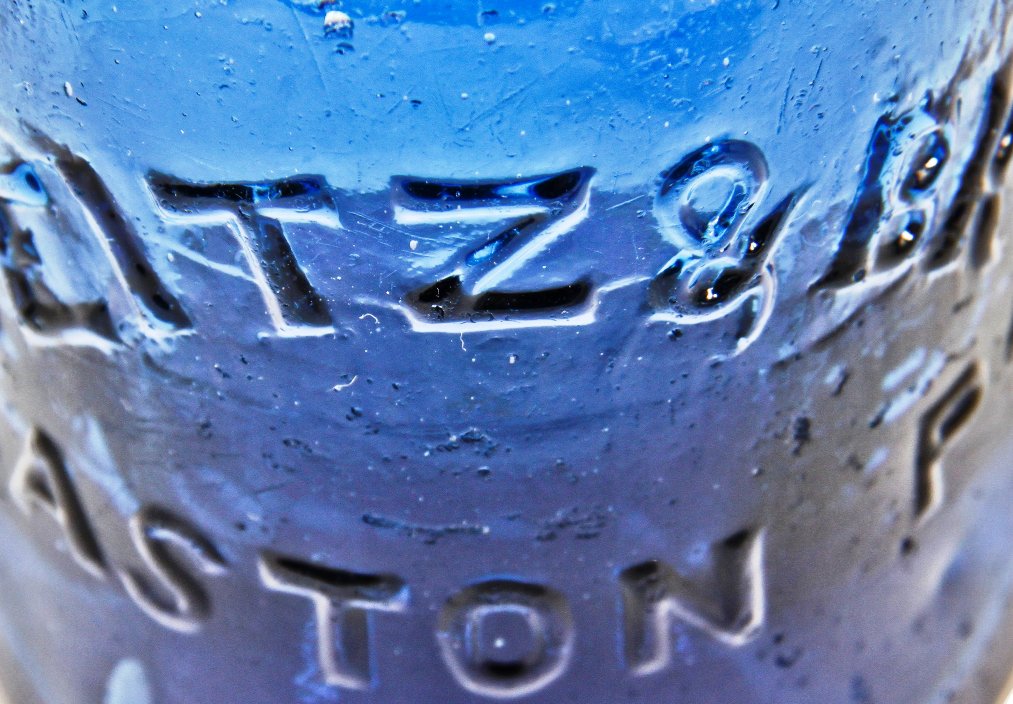 mid-nineteenth century (1853-1865) sapphire blue pontiled porter bottle finished with a tapered collar and ring manufactured by a philadelphia area glassworks.
