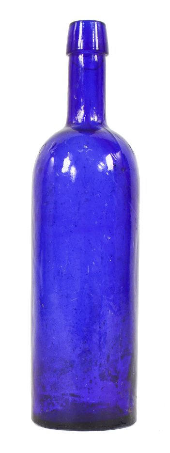 rare 1860’s medium cobalt “cylinder fifth” shaped medicine bottle manufactured for pharmacologists reed, carnrick, & andrus in new york