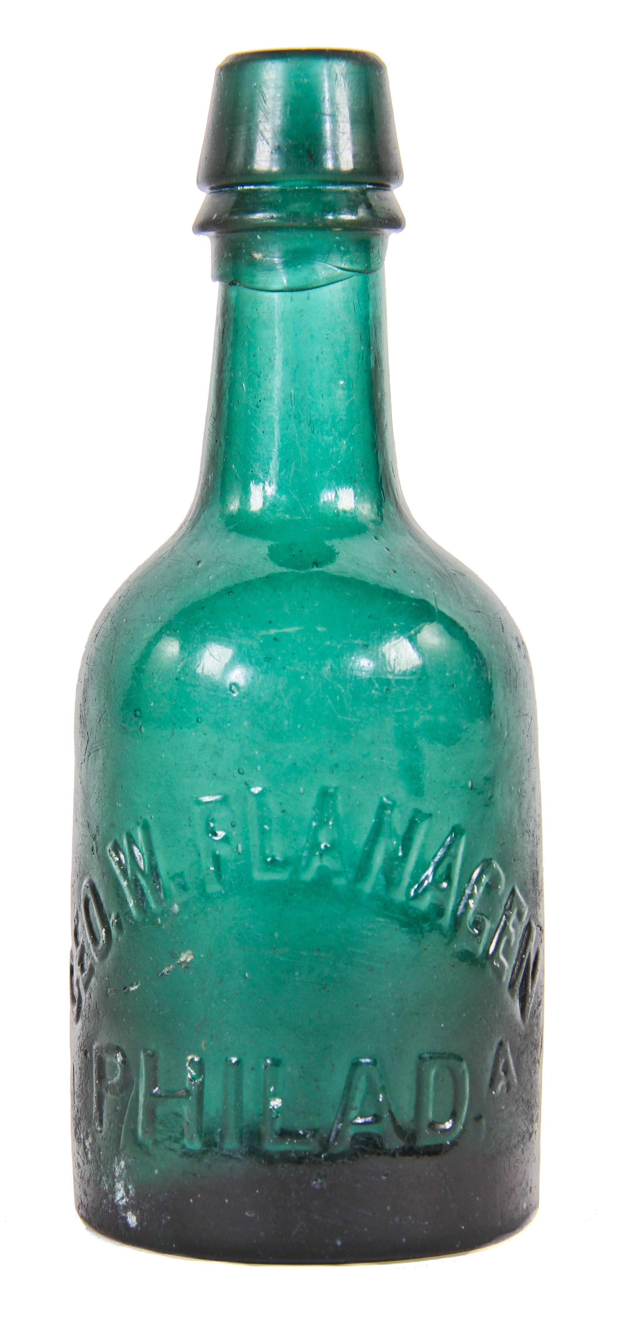 original antique american mid-nineteenth century (1857-1865) deep emerald porter style ale or soda bottle with an applied double tapered lip with significant slop evident