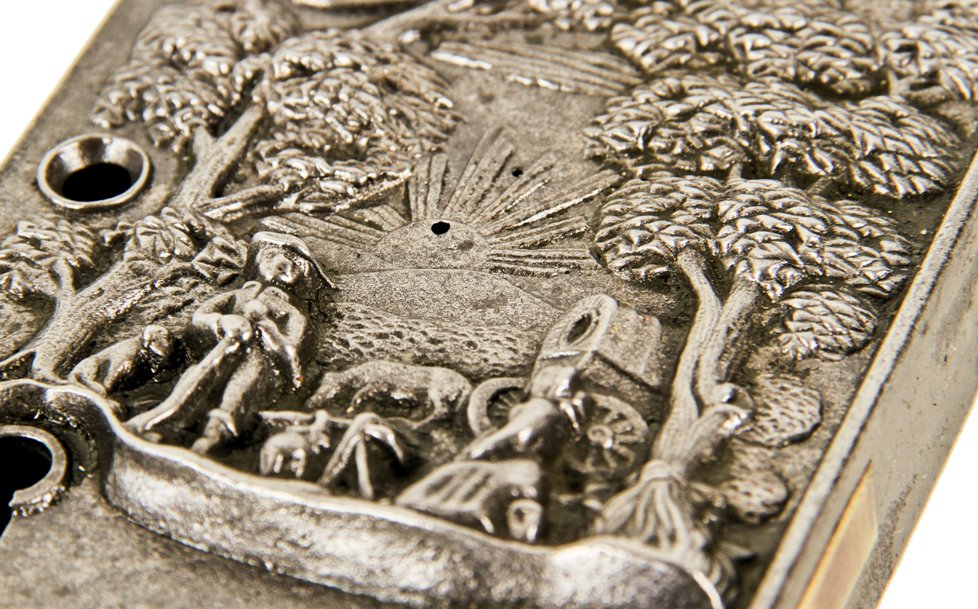 hard to find and highly collectible pre-civil war era deeply embossed and heavily ornamented "emigrant" residential passage cast iron door rim lock