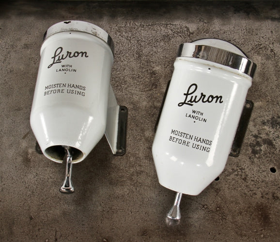 one of two original and intact american depression era c. 1930's "luron" brand wall-mount factory lavatory powdered soap dispenser with original reservoir cap