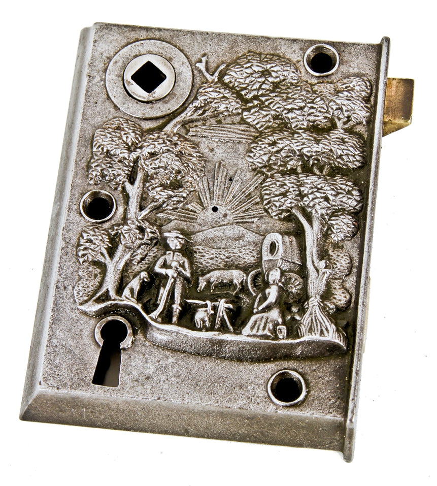 hard to find and highly collectible pre-civil war era deeply embossed and heavily ornamented "emigrant" residential passage cast iron door rim lock
