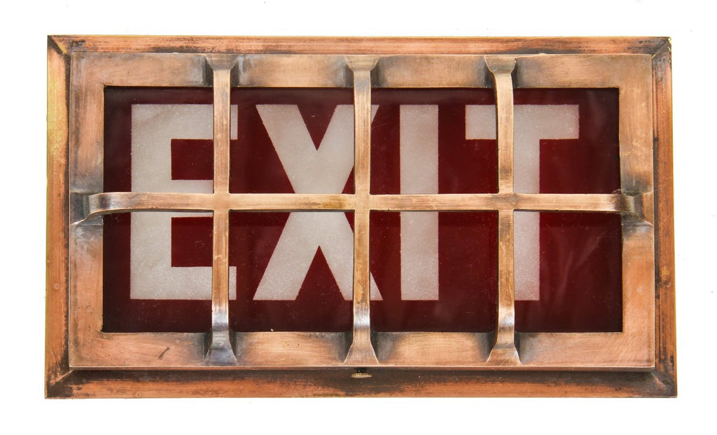 very rare and unusual c. 1915 single-sided wall mount illuminated ruby red glass exit sign with etched lettering and cast bronze cage guard