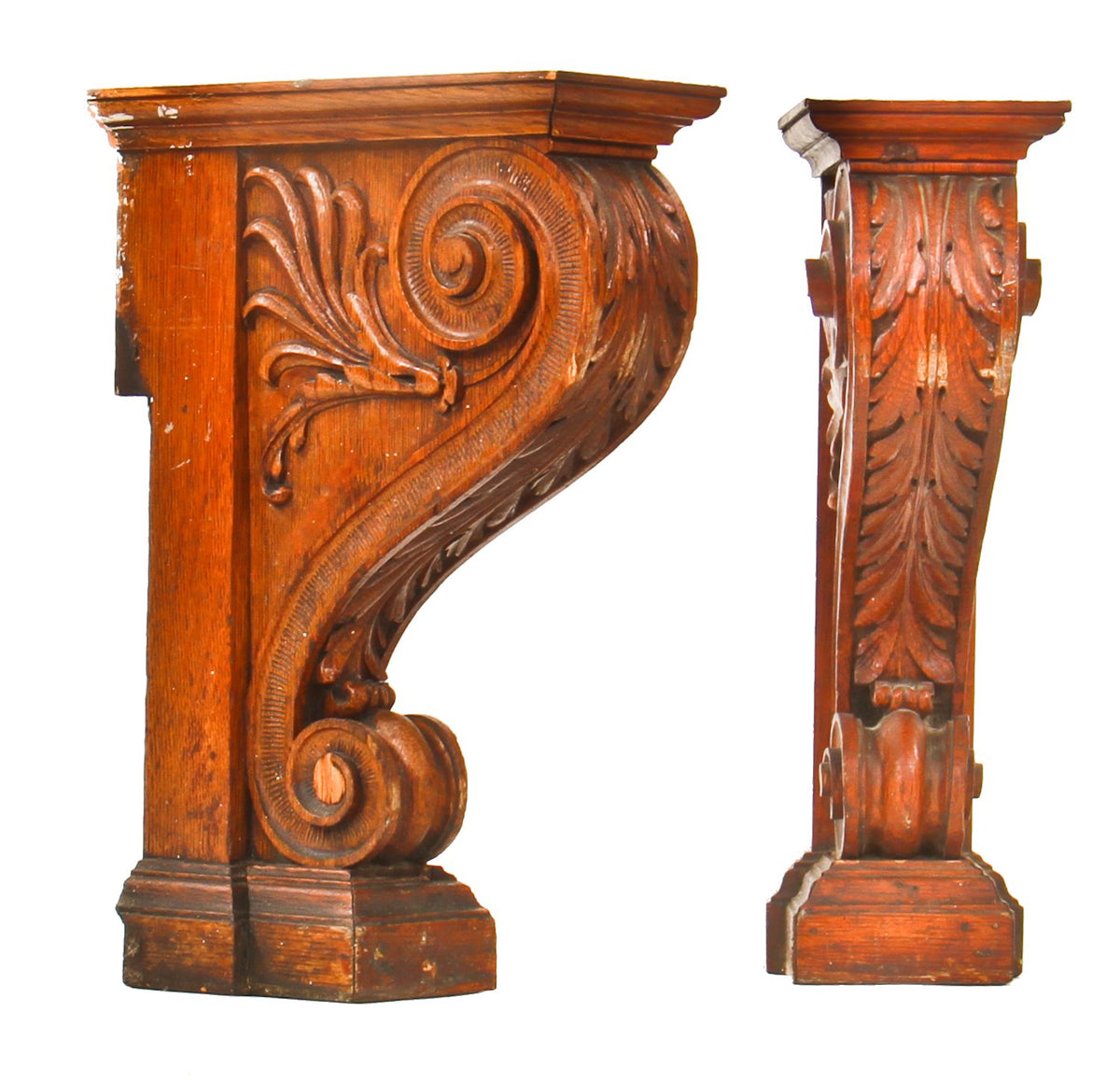 two matching opposed late 19th century remarkable hand carved solid oak wood pier mirror or console undershelf supports with intricate leafage