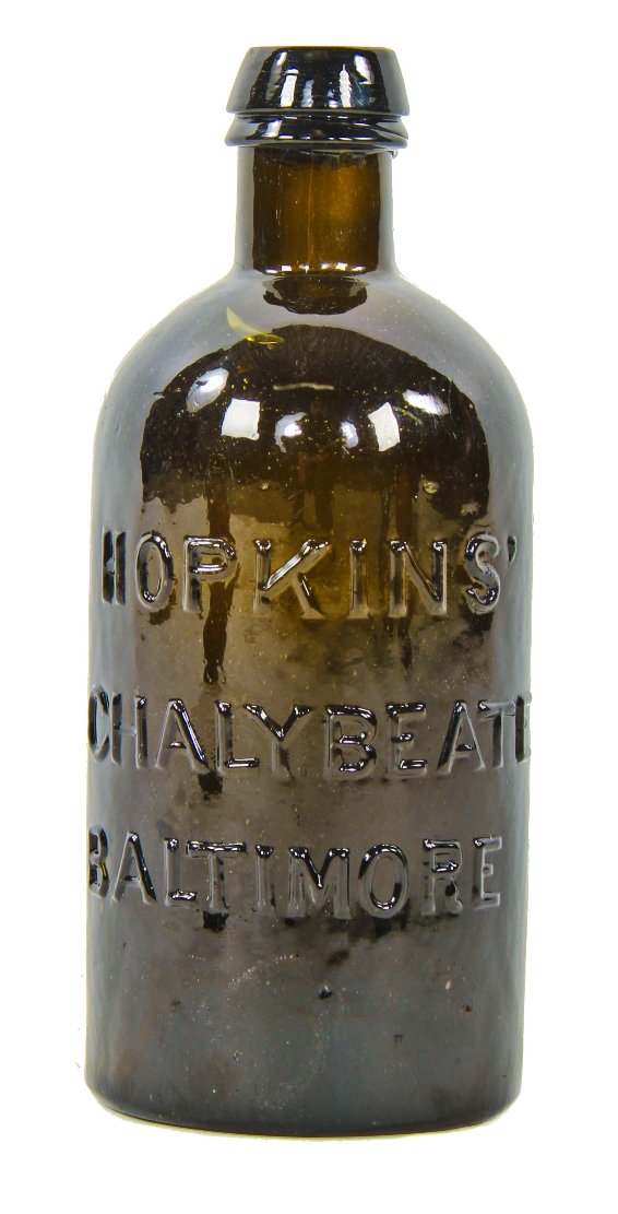 rare  mid-nineteenth century yellow olive pint shaped "chalybeate" mineral water bottle manufactured for william hopkins in baltimore, md.