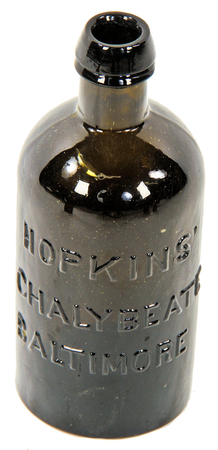 rare  mid-nineteenth century yellow olive pint shaped "chalybeate" mineral water bottle manufactured for william hopkins in baltimore, md.