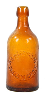 rare and all original vibrant honey amber weiss beer bottle manufactured for new york beer bottler w.a. harrington