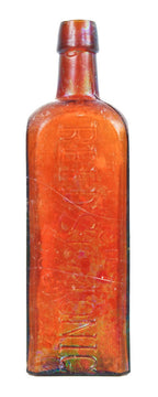 heavily iridized 19th century privy dug antique american square amber bitters bottle with tapered collar manufactured for geo w.m. reed in connecticut.