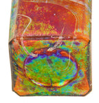 heavily iridized 19th century privy dug antique american square amber bitters bottle with tapered collar manufactured for geo w.m. reed in connecticut.