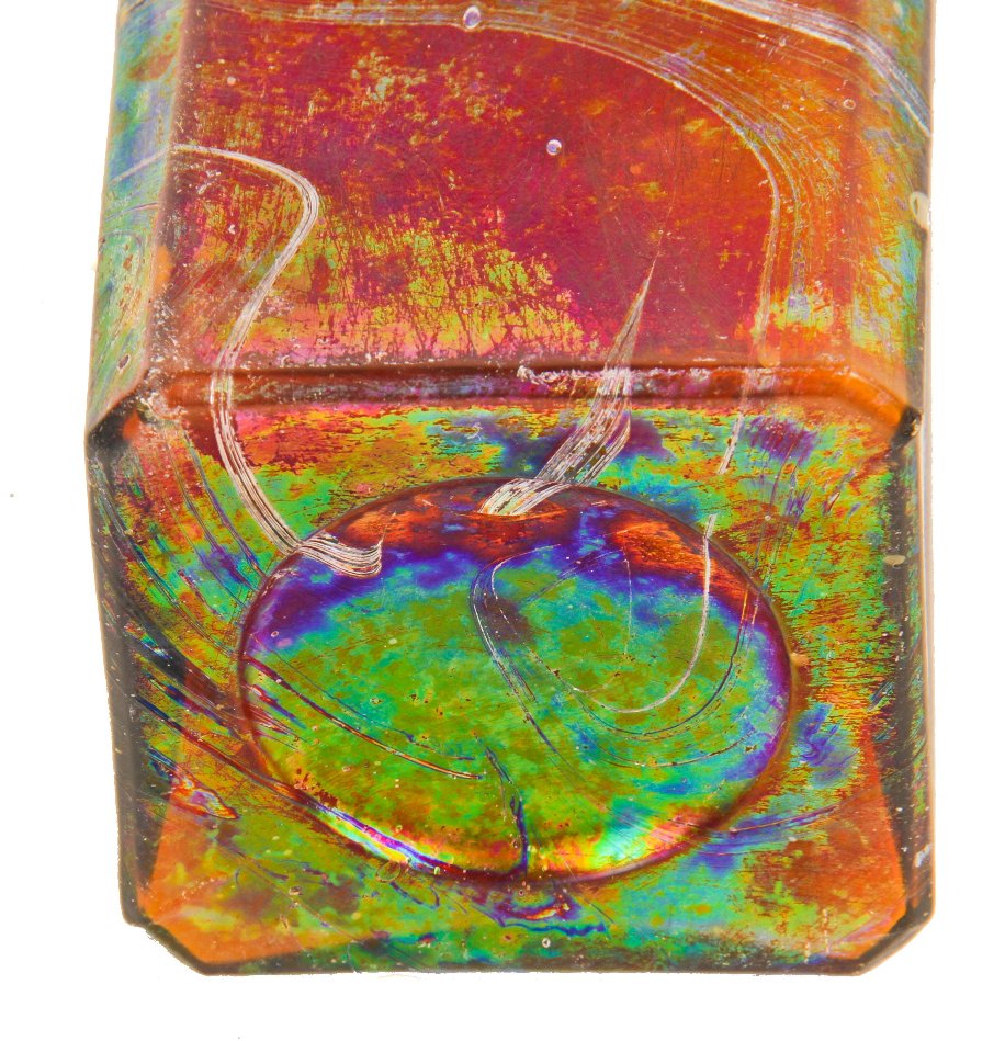 heavily iridized 19th century privy dug antique american square amber bitters bottle with tapered collar manufactured for geo w.m. reed in connecticut.