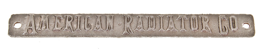 early 20th century original single-sided cast iron "american radiator company" commercial building basement boiler name plaque with opposed mounting holes