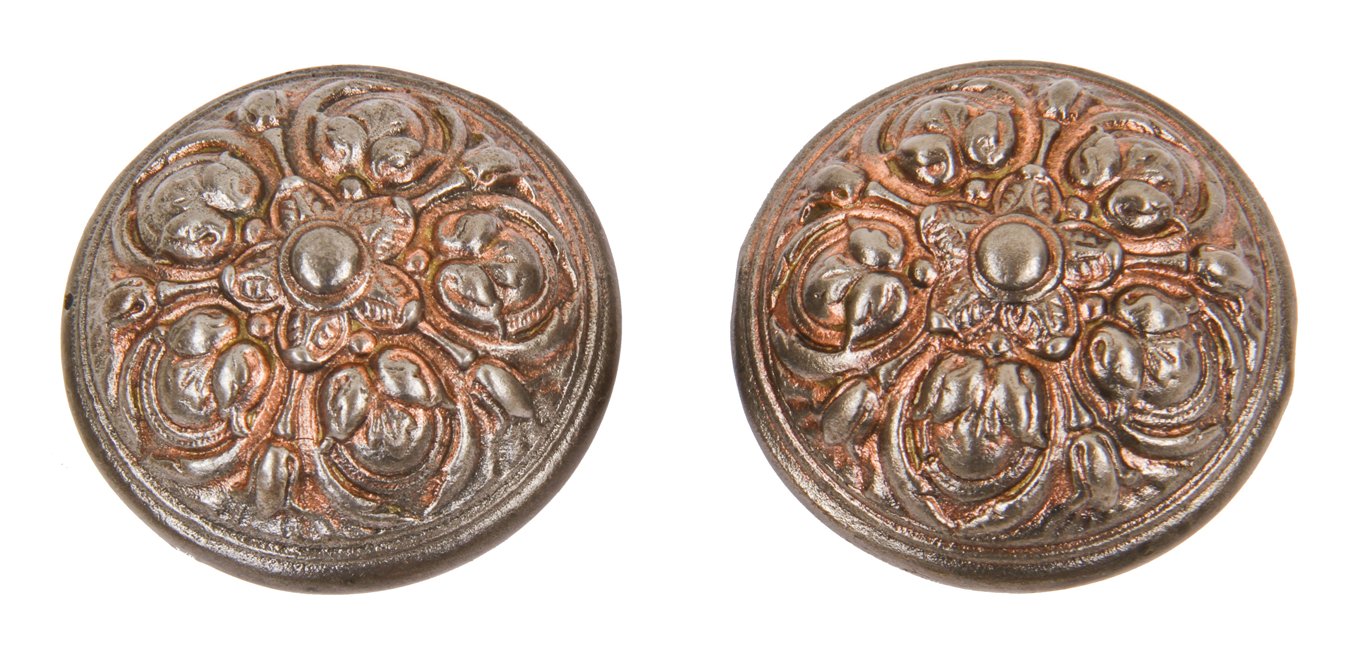 original late 19th century antique american "pasco" pattern interior residential ornamental cast iron doorknobs with a copper-plated wash