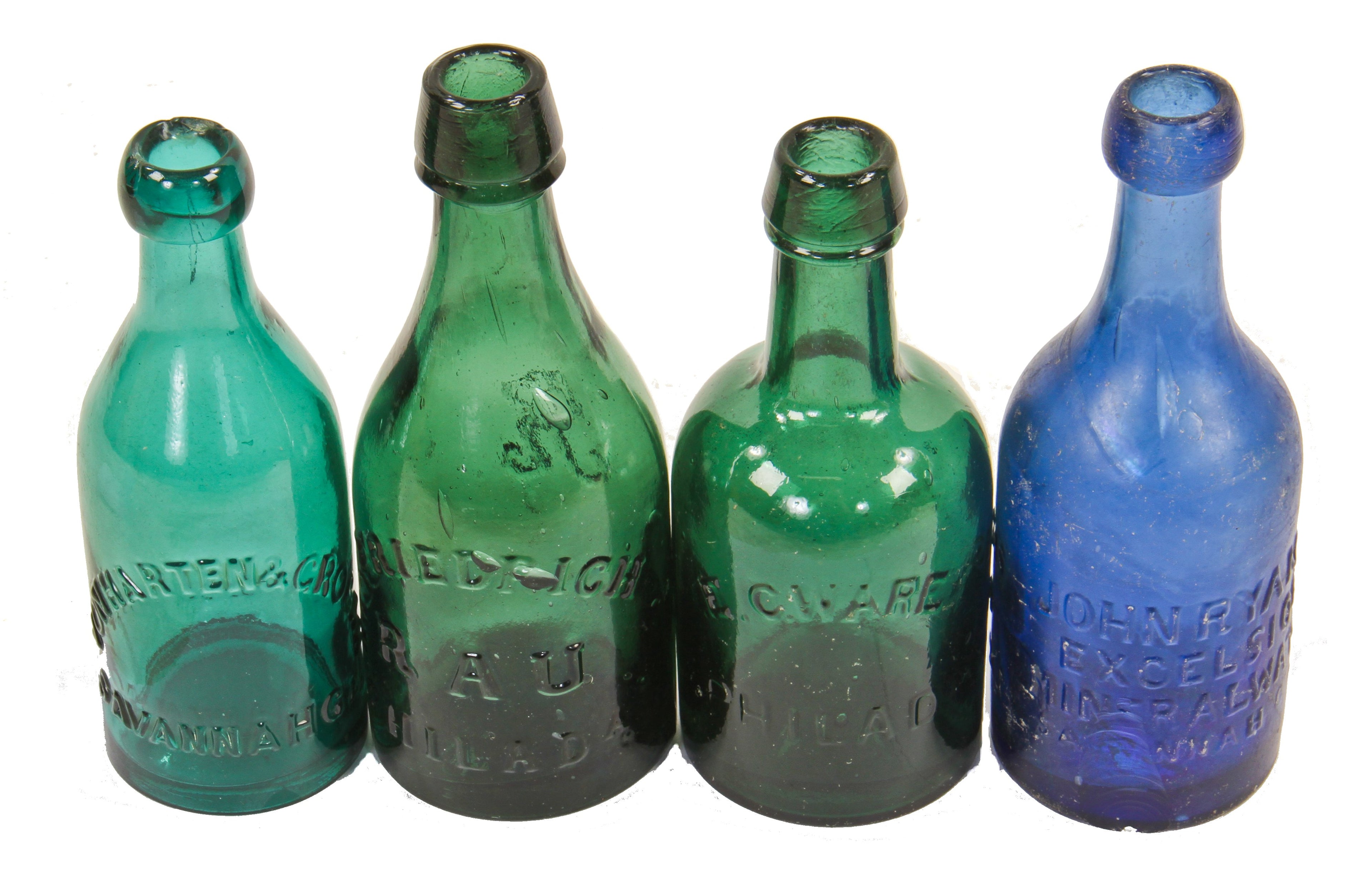 mid-nineteenth century single original and intact privy dug emerald green porter style pontiled bottle manufactured for e.c. ware