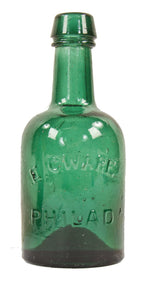 mid-nineteenth century single original and intact privy dug emerald green porter style pontiled bottle manufactured for e.c. ware