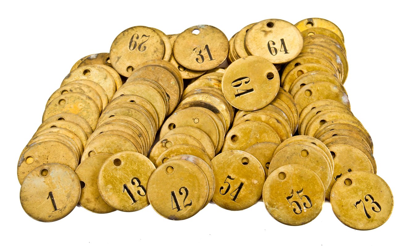 large lot of early 20th century historic la salle hotel stamped brass numbered coat check circular-shaped tags with incised numbers