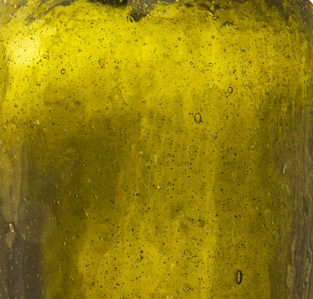 original and intact crude c. 1840's black glass quart bottle manufactured for new york bottlers clarke & white.