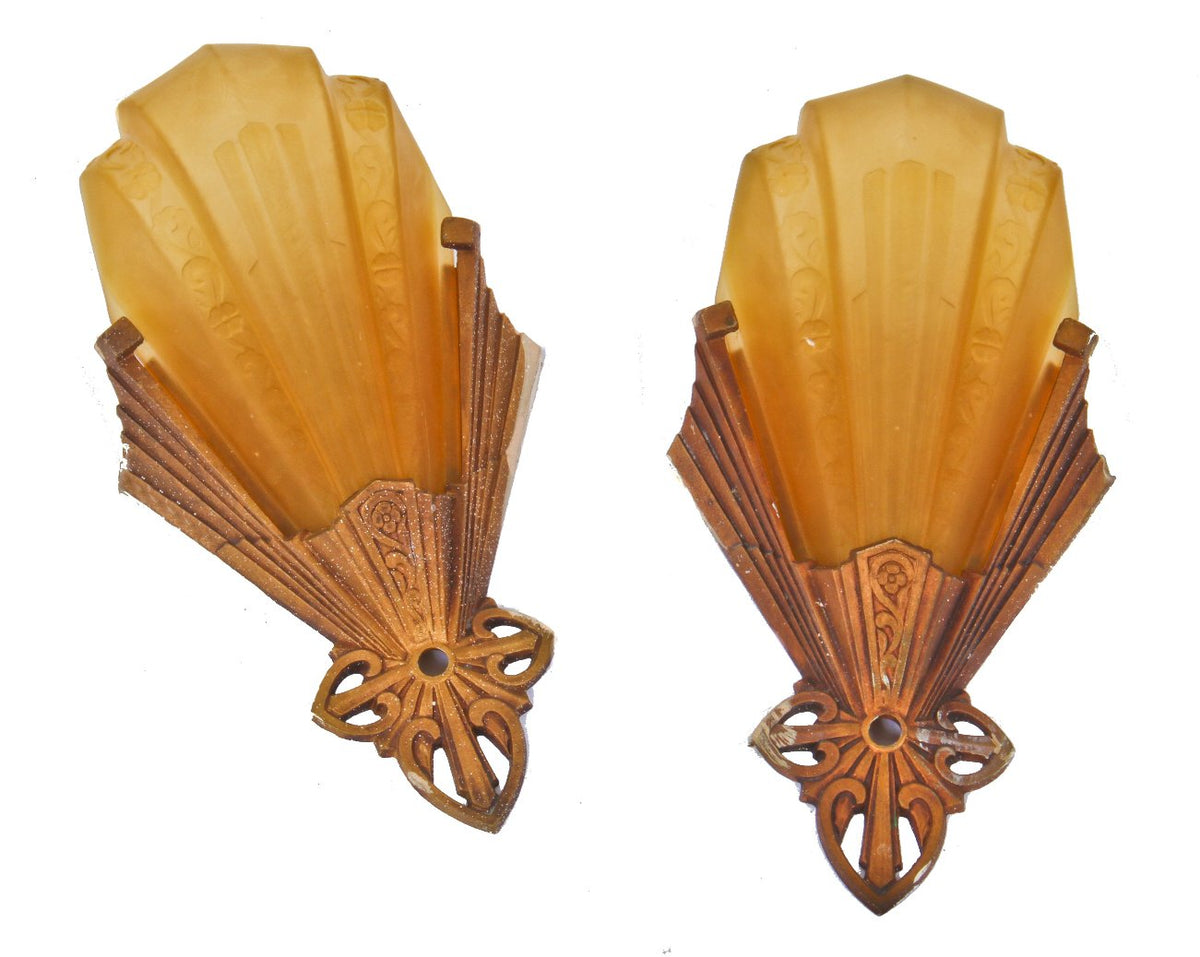 pair of all original highly desirable intact american depression era amber pressed glass slip shade wall sconces with original ornamental shade fitters