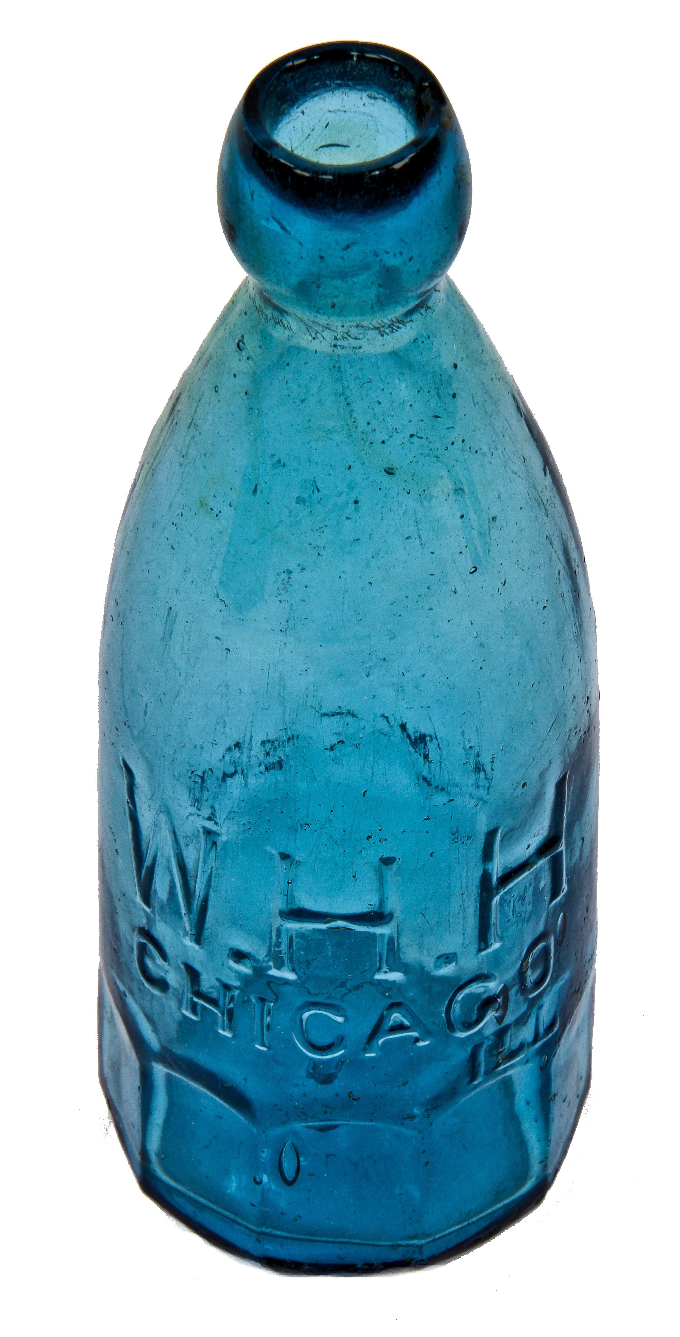 original and amazingly intact c. 1860's teal-colored glass william h. hutchinson (w.h.h.) paneled or "mug" base soda or mineral water bottle with applied blob top